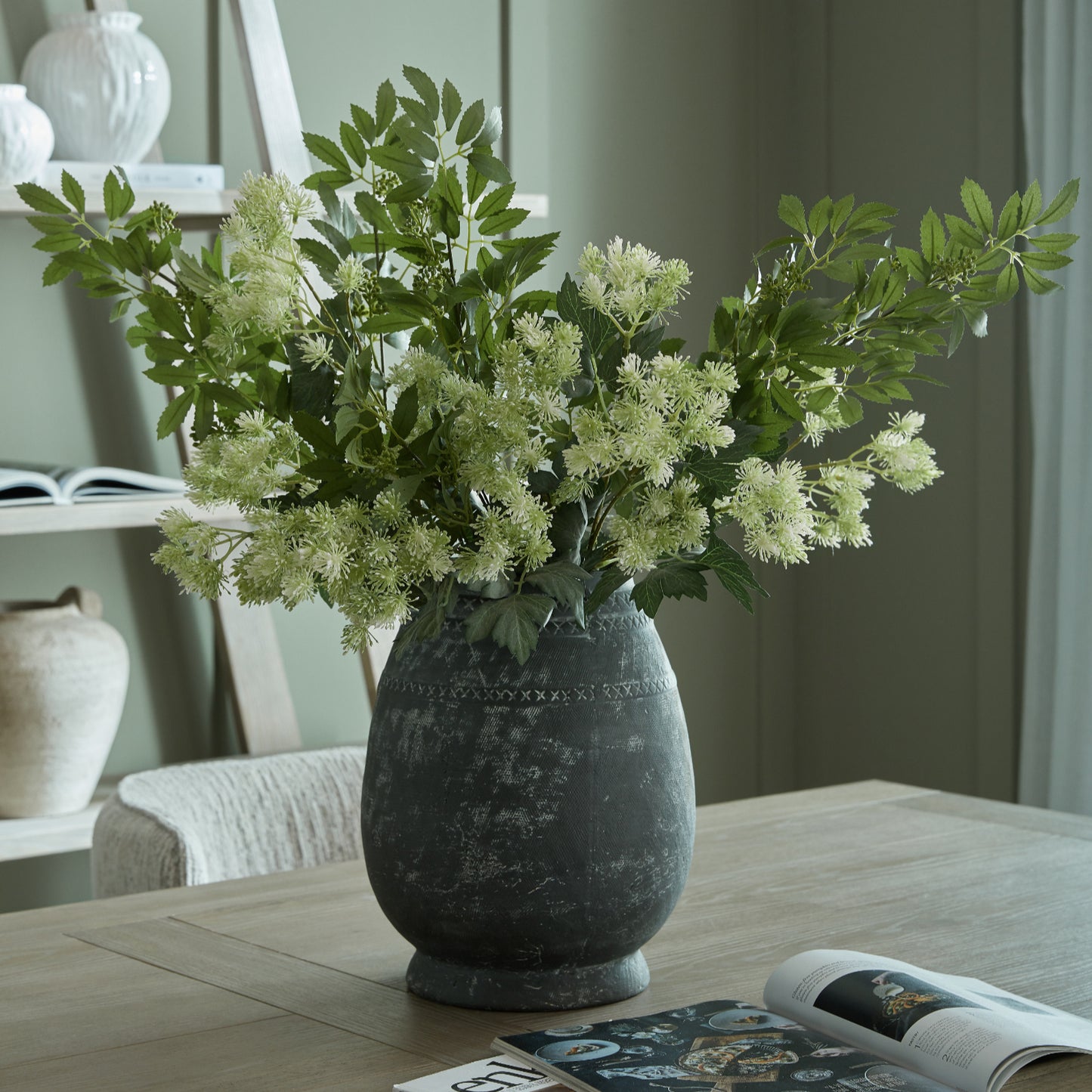 Etched black tall ceramic vase