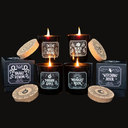 Midnight Ritual set of six scented candles in black jars with cork lids on a charcoal background